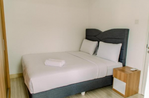 Tranquil and Warm 2BR Apartment at Urban Heights Residences BSD City By Travelio